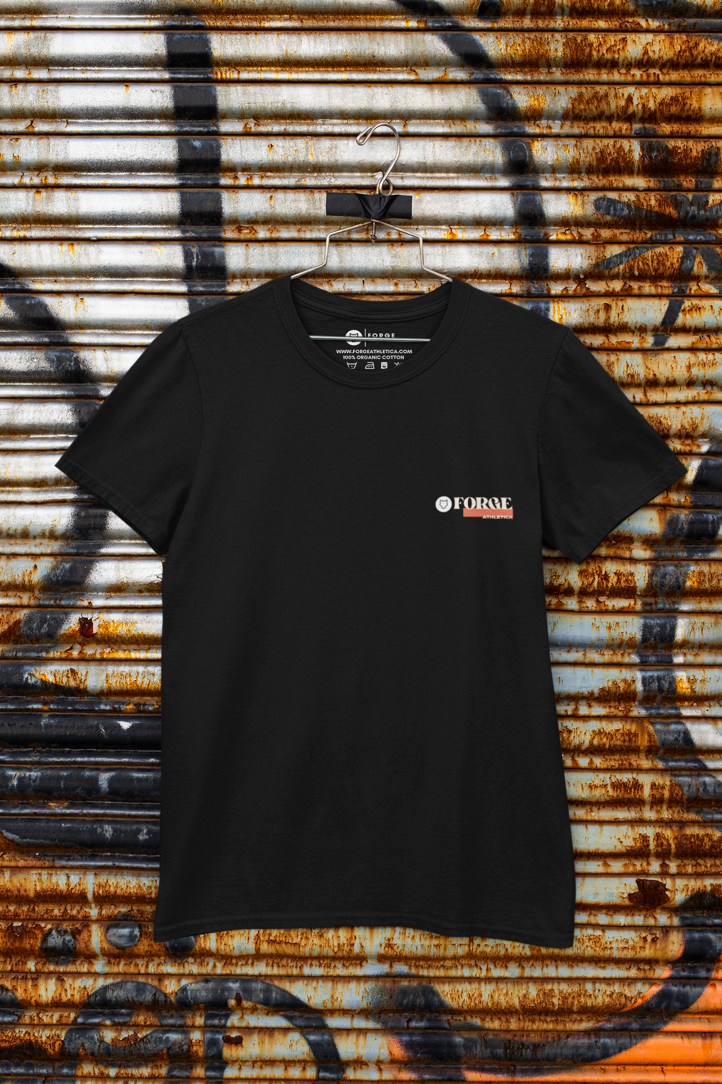 Front view of a hanging Black Unisex Round Neck T-Shirt on a hanger with a graffiti on the back.